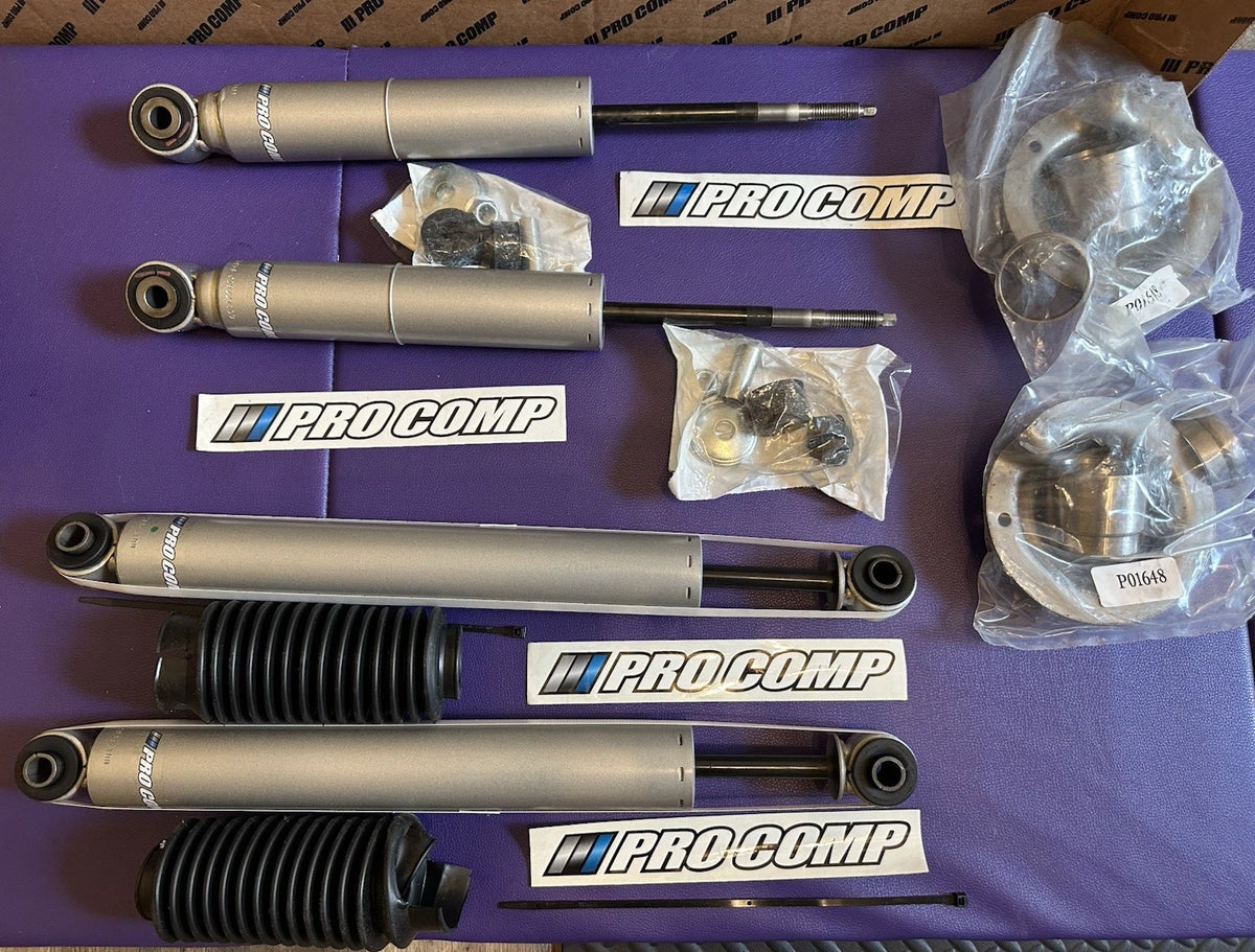 Set of 4 Pro Comp Monotube Shocks & Struts for Nissan Titan (2004–2015)