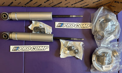 Set of 4 Pro Comp Monotube Shocks & Struts for Nissan Titan (2004–2015)